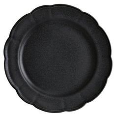 an empty black plate on a white background