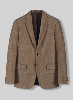 The Irish Brown Herringbone Tweed Suit will become the standard of business dressing and by far the most ubiquitous option. Crafted from wool, the Irish Brown color of the suit will surely influence a veteran dresser to buy the suit for building a sharp wardrobe. Team it up with a matching waistcoat, a white shirt and dark brown derby shoes.  Look Includes  Irish Brown Herringbone Tweed Fabric  Two Button Jacket Style  Notch Lapel  Horn Brown Buttons  Single Vent  Three Cuff Buttons  Two Welted Back Pockets on Trousers    Click 'Customize Now' to modify the look if needed.   Lining: Viscose, Dry Clean. Black Velvet Suit, Grey Tweed Suit, Herringbone Tweed Jacket, White Linen Suit, Green Velvet Jacket, Peaky Blinders Suit, Brown Derby, Light Grey Suits, Tweed Pants