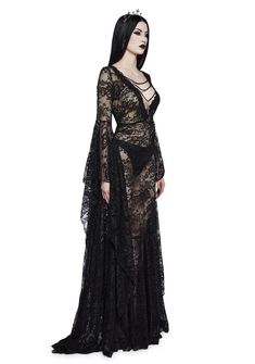 you’re a Victorian splendor in the shadows. This maxi dress has a lace construction, a v-neckline with chain detail and dangling cross charm, long floor-length flare sleeves, and side zipper closure. V-neck Gown With Lace Trim For Party, Gothic V-neck Dress For Night Out, Evening Gown With V-neck Lace Sleeves, V-neck Evening Gown With Lace Sleeves, Floor-length Lace Trim Maxi Dress For Night Out, Gala Maxi Dress With Lace Trim, Lace Maxi Dress With Lace Sleeves For Evening, Party V-neck Maxi Dress With Lace Sleeves, Gala Maxi Dress With Lace Sleeves