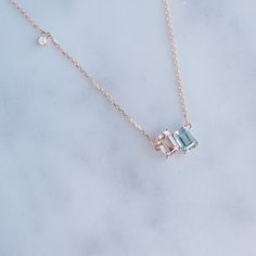 Emerald Aquamarine and Morganite is very rare and absolutely extraordinary, especially when complemented with 2 white diamonds on either side. For more about us, please visit:  https://www.diamantladiva.com/ How to measure your ring size at home, please visit: https://www.diamantladiva.com/pages/sizing More videos, please visit: https://www.instagram.com/diamantladiva/ FULL SERVICE FROM OUR TERM - Handmade Fine Jewelry - Natural Real Diamonds & Precious stones - High Quality Materials, Water Wedding Diamond Necklace With Ethical Diamonds, Rose Gold Diamond Necklace With Gemstone For Wedding, Blue Rose Cut Diamond Necklaces For Weddings, Blue Rose Cut Diamond Necklace For Weddings, Blue Rose Cut Diamond Wedding Necklace, Emerald Cut Sapphire Jewelry In Rose Gold, Gemstone Wedding, Handmade Fine Jewelry, Bridal Gift