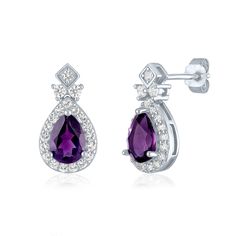 These elegant sterling silver drop earrings feature two pear-shaped, brilliant cut natural amethyst stones, each measuring 7MMx5MM, adding a touch of regal beauty to any outfit. The sparkle is enhanced by 40 round, brilliant cut lab-created white sapphire stones in varying sizes, making these earrings a dazzling choice for any occasion. | Amethyst and Lab-Created White Sapphire Drop Earrings | Sterling Silver | Size 8.00mm | Helzberg Diamonds Elegant Amethyst Teardrop Earrings, Classic Teardrop Purple Earrings, Elegant Purple Gemstone Teardrop Earrings, Formal Teardrop Amethyst Earrings, Formal Amethyst Teardrop Earrings, Purple Drop Teardrop Earrings For Formal Occasions, Purple Teardrop Drop Earrings For Formal Occasions, Formal Teardrop Pendant Gemstone Earrings, Formal Teardrop Gemstone Earrings