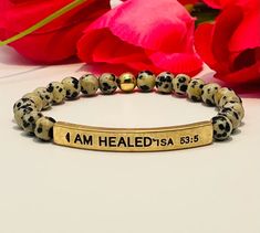 This super cute inspirational beaded bracelet comes with a gold-tone bar with the Isaiah 53:5 bible verse; proclaiming "I Am Healed"!!The bar with Isaiah 53:5 is 1.5" wide.The beads are 6mm.🎁 All pieces come packaged in a gift box 🎁Thank you for visiting Chosen By His Grace ❤️ I Am Healed, Isaiah 53 5, By His Grace, Bracelets For Women, The Bar, Bracelet Designs, Bible Verse, Beaded Bracelet, Gold Tones