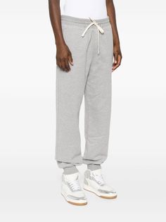 Miu Miu logo-patch Track Pants - Farfetch Casual Cotton Miu Miu Bottoms, Gray Joggers With Drawstring, Casual Miu Miu Bottoms With Pockets, Gray Sporty Drawstring Pants, Gray Drawstring Pants For Jogging, Gray Sporty Joggers With Drawstring, Sporty Cotton Sweatpants For Elevated Casual, Sporty Cotton Joggers For Elevated Casual, Gray Cotton Joggers With Ribbed Waistband