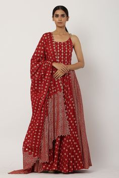 Deep red anarkali in cotton mul base fabric featuring beaded straps, sequins embroidered bodice and multi motif prints. Paired with cutwork hem dupatta.
Component: 2
Pattern: Printed
Neckline: Round
Sleeve Type: Sleeveless
Fabric: Cotton Mul, Lining: Cotton Mul
Color: Red
Other Details: 
Beaded straps
Sequins work on yoke
Triangular cutwork hem dupatta
Occasion: Destination Wedding, Wedding - Aza Fashions Churidar Sets For Women, Kalidar Anarkali, Red Anarkali, Anarkali With Dupatta, Kurta Lehenga, Red Kurta, Latest Salwar Kameez, Embroidered Anarkali, Beaded Strap