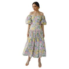 This dreamy vintage 1980s Victor Costa pastel floral dress features the most 1980s shape, including voluminous puff sleeves, and a fitted princess-seam bodice with a dropped waist. It subtly creates an hourglass shape. These puff sleeves are really exaggerated, which I love, with tulle on the interior to help them hold their shape. There is some versatility with the neckline, as the sleeves can be worn off the shoulder, and can also be pulled up and worn on the shoulder; there is hidden elastic at the top of the sleeve that allows it to firmly stay in place no matter how you wear it. The fitted bodice gives way to a fuller skirt— there is a built-in tulle petticoat to support the fullness of the skirt. The pastel floral print feels like it was painted in watercolor, with all the best sprin Pastel Floral Dress, Calico Dress, Tulle Petticoat, Victor Costa, Tea Gown, Drop Waist Dress, 1980s Dresses, Dress Drawing, Hourglass Shape