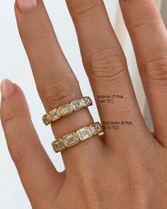 a woman's hand with three rings on it and the measurements for each ring