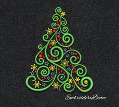 a green christmas tree with stars and swirls on it's side, embroidered onto a black background