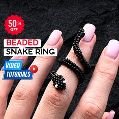 a woman's hand with two rings on it and the words beaded snake ring