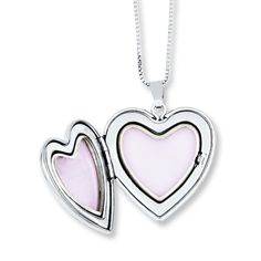 This mother and daughter necklace set features a heart-shaped locket and pendant with an enamel rose. The locket also includes the message "I love you." The set is crafted of sterling silver and comes with 14- and 18-inch box chains so mother and daughter have the perfect fit. Each necklace is secured with a spring ring clasp. Keepsake Locket Necklace For Valentine's Day, Nickel-free Locket Necklace Gift, Valentine's Day Keepsake Locket Necklace, Silver Jewelry For Mother's Day Keepsake, Mother's Day Keepsake Jewelry With Hallmark, Heart-shaped Jewelry For Valentine's Day, Sterling Silver Keepsake Charm Necklace, Double Heart Charms Jewelry For Keepsake, Double Heart Charms Keepsake Jewelry