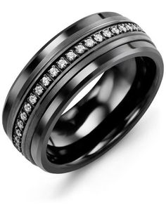 a black wedding ring with channeled diamonds