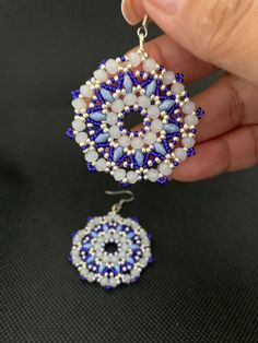 An exquisitely hand crafted beaded earring made with 3 by 4mm crystal beads, mini duos and 11/0 seed beads, and threaded together with Fireline thread. A simple earring that is light weight and elegant looking. For more beautiful earrings visit my store at http://elegancebynams.Etsy.com CARE TIPS: Avoid high humidity and keep the beaded jewelry dry and away from agressive cleaning agents to maintain their quality and colour. White Beaded Earrings With Spacer Beads For Gift, Round Spacer Beads Jewelry For Crafting, Handmade Dainty Beaded Drop Earrings, White Spacer Beads For Crafting Jewelry, Single Round Beaded Earring As A Gift, White Round Beaded Earrings As Gift, Handmade Round Crystal Earrings For Gifts, Dainty Handmade Beaded Earrings As Gift, White Beaded Round Earrings For Gift