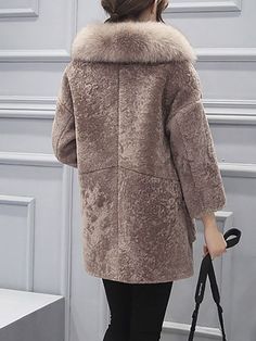 Fluffy Paneled Buttoned Pockets Fur and Shearling Coat | Newarrivaldress.com Elegant Shearling Fur Coat For Cold Weather, Winter Shearling Fur Coat With Faux Fur Trim, Beige Shearling Fur Coat For Winter, Beige Shearling Fur Coat With Faux Fur Trim, Mink Colored Shearling Fur Coat With Faux Fur Trim, Mink-colored Sheepskin Winter Fur Coat, Mink Colored Sheepskin Fur Coat For Winter, Winter Mink-colored Sheepskin Fur Coat, Winter Mink Color Sheepskin Fur Coat