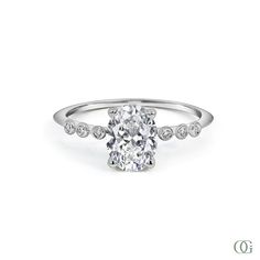 W Luxury Oval Diamond Ring, Oval Diamond Halo Ring For Formal Occasions, Oval Halo Diamond Ring For Formal Occasions, Oval Halo Ring For Formal Occasions, Timeless Oval Halo Diamond Ring, Formal Oval Halo Ring With Prong Setting, Dazzling Oval Rings For Formal Occasions, Luxury Oval Diamond Ring With Prong Setting, Luxury Oval Diamond Ring With Halo Design