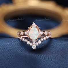 Vintage Opal Bridal Set Rose Gold Pearl Diamond Curved Band Opal Wedding Rings 2PCS Engagement Ring Set Delicate Promise Ring Women Jewelry Information: ♡ Handmade, high-quality item ♡ Material: SOLID 14K/18K GOLD ( can be made in yellow/white/rose gold ) ♡ Center stone: Natural Australian opal ♡ Size/Weight: 8x6mm ♡ Cut - Pear Shaped ♡ Color: White opal with fire ♡ Side stones: Moissanite ♡ Weight: About 0.16ct ♡ Cut - Round Shaped Or natural diamonds ♡ Weight: About 0.16ct ♡ Clarity - SI-VS ♡ Delicate Opal Wedding Ring, Heirloom Rose Gold Jewelry For Wedding, Heirloom Rose Gold Wedding Jewelry, White Opal Ring For Wedding, Rose Gold Wedding Ring Jewelry, Heirloom Silver Opal Ring For Weddings, Delicate White Rings For Wedding, Delicate White Wedding Rings, White Heirloom Jewelry For Wedding