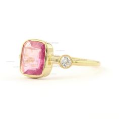 Description Natural Pink Tourmaline Ring, Solid 14K Yellow Gold Ring, Diamond Engagement Ring, October Birthstone Ring, Handmade Ring, Womens Ring ≫ Features * Items Code: SPBR00434/SGR01865 * Solid 14K Yellow Gold with stamped * 18K also available - Additional fees may apply) * More options in gold color: Rose, yellow, White gold * Diamonds Wt: 0.07 Ct. * Diamond color: G-H * Diamonds Clarity: SI * Diamonds Cut: Brilliant * Pink Tourmaline Weight:- 1.34 Ct. * Ring Size 3 to 10 (As per your requ Pink Tourmaline Rings With Gemstone Accents, Pink Ruby Ring With Accent Stones In 14k Gold, Pink Ruby Gemstone Ring In 14k Gold, Pink Diamond Ring With Gemstone Accents For Gift, Pink Ruby Ring With 14k Gold And Accent Stones, Pink Ruby Ring With 14k Gold, Fine Jewelry Pink Ring With Bezel Setting, Pink Emerald Ring Fine Jewelry, Pink Sapphire Ring In 14k Gold With Bezel Setting