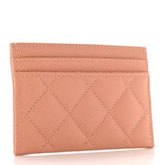 This is an authentic CHANEL Caviar Metal Perforated Quilted CC Card Holder in Beige. This fashionable card case is crafted of pebbled caviar leather in coral pink. It features a perforated gold Chanel CC logo on the front and opens to a pink fabric interior. Cc Card, Gold Chanel, Chanel Caviar, Chanel Wallet, Beige Fabric, Dark Beige, Card Holder Wallet, Cc Logo, Pink Fabric