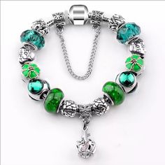 Green Summer Crown Amour Charm Bracelet. Length 18cm. Clasp Type Pandora Style Elegant Green Metal Charm Bracelet, Green Metal Charm Bracelet, Brazilian Bracelet, Pandora Green, Black Leather Cuff Bracelet, Green Crown, Brand Bracelet, Prayer Bead Bracelet, Crown Charm