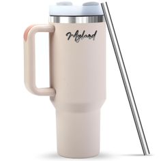 a travel mug with a straw in it and the word myland written on it