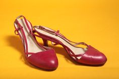 A super cute pair of 50s closed toe kitten heels with a narrow slingback a with small brass buckle fastening. Made from buttery soft raspberry red calf leather with leather soles. The shoes are labelled 'Young Colony Celebrities by Saxone' size 5 B. Condition The shoes are in very good condition considering their age. They have wear to the soles but have bee re-heeled at some point. There are scuffs to the toes and heels but are still completely wearable. Measurements: Inside heel to toe - 8.7" Vintage High Heel With Penny Strap, Vintage Low Heel Shoes With Heel Loop, Vintage Heels With Low Heel And Heel Loop, Spring Vintage Kitten Heels, Retro Evening Heels With Heel Loop, Vintage Open Toe Slingback Pumps, Vintage High Heel Kitten Heels For Spring, Retro Penny Strap Heels For Evening, Vintage Kitten Heels With Pointed Toe For Spring