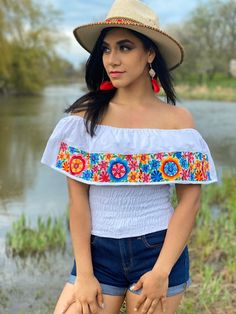 This Beautiful Off the Shoulder Crop Top is the perfect Top for a fun day out. -It's made out of cotton, has an elastic waist and is full of vibrant embroidered florals. Please note: *This blouse comes in one size which fits sizes Small and Medium. **More colors available here: https://www.etsy.com/es/listing/843962112/blusa-crop-top-margaritas-blusa-mexicana?ref=listing_published_alert Fitted Embroidered Beach Top, Multicolor Embroidered Tops For Cinco De Mayo Fiesta, White Tops For Summer Fiesta, White Bohemian Top For Cinco De Mayo, Fitted Embroidered Multicolor Tops, Fitted Tops With Multicolor Embroidery For Spring, Spring Fitted Tops With Multicolor Embroidery, Fitted Tops With Multicolor Embroidery For Vacation, Fitted Top With Multicolor Embroidery For Vacation