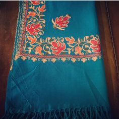 All Over Hand Embroidered Floral Kashmir Wool Wrap Evening Piano Shawl/Dupatta Scarf/India Floral Wool Woolen Scarf ***** Exclusive - Only 1 In Stock ****** Shawl - Indian Shawl - Kashmir Shawl - Handwoven Scarf - Woolen Shawl- Embroidered Shawl - Wraps Shawls This Shawl Is Embellished With Beautiful Floral Embroidery Capturing The Attention Of One And All. Hand-Woven By Locals In Kashmir. The Base Of The Shawl Is Made Of Turquoise Colored Wool Threads. You’ll Notice The Difference From The Mome Bohemian Blue Dupatta With Intricate Embroidery, Blue Bohemian Embroidered Fabric With Traditional Drape, Bohemian Blue Embroidered Fabric With Traditional Drape, Bohemian Blue Dupatta With Embroidered Border, Bohemian Blue Dupatta With Floral Embroidery, Traditional Turquoise Embroidered Dupatta, Traditional Turquoise Dupatta With Intricate Embroidery, Traditional Blue Shawl For Festivals, Blue Bohemian Shawl For Festivals