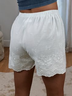 Absolutely adorable Vintage-esque High Waisted White Eyelet Shorts ft. double lining & stretchy elastic waist. These do not have pockets. Not necessarily see through but lighter/nude Undies are recommended! Maclaine is 5'7 and wearing a size Small. She typically wears a 26 in jeans and the small fit great! Waist does have stretchy elastic! 100% Cotton (lining 100% Viscose Rayon) Non-stretch Beach Shorts, Stretch Short Length Vacation Pants, Non-stretch Beach Shorts With Elastic Waistband, Beach Shorts With Elastic Waistband And Non-stretch, Summer Bottoms With Elastic Waistband And Stretch, Non-stretch Short Summer Bottoms, Stretch Bottoms With Elastic Waistband For Summer, Non-stretch Summer Shorts, White Pull-on Style Bottoms For Vacation