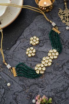 The green Kundan choker necklace set is inspired by the rich Indian jewelry-making techniques handcrafted by the artisans to celebrate the amalgamation of craftsmanship and modern design. The Indian Kundan choker is a most elegant and perfectly crafted choker to bejewel your neckline with shimmering Kundan that will create a style statement wherever you go. Pair this gorgeous replica of Bollywood jewelry with your ethnic or contemporary ensembles and create a look to remember.  An ode to the bea Kundan Choker Necklace, Sabyasachi Jewelry, Sabyasachi Jewellery, Kundan Choker, Earrings Indian, Bollywood Jewelry, Choker Necklace Set, Kundan Necklaces, Victorian Jewelry