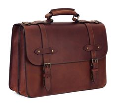 This handcrafted men's leather briefcase was inspired by vintage lawyer briefcases from decades ago. Made of full grain leather that's rich in character and solid antique brass hardware, this bag is built to last. Office Satchel With Brass Hardware, Classic Oiled Leather Business Bags, Oiled Leather Business Satchel Briefcase, Business Oiled Leather Satchel Briefcase, Timeless Leather-handled Briefcase For Business, Classic Oiled Leather Satchel Briefcase, Timeless Briefcase With Leather Handles For Business, Timeless Business Briefcase With Leather Handles, Bridle Leather Briefcase With Leather Lining And Satchel Shape