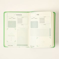 an open notebook with notes and numbers on it