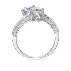 Ring Style: Cocktail RingsSetting: ProngShape: RoundStone: Cubic ZirconiaStone Cut: RoundRing Size: 7Metal Color: WhiteRing Gallery Height: 6.2mmRing Top Length: 12.5mmRing Top Width: 21.3mmRounded Carat Weight: 2 1/4 Ct. T.w.Metal: Sterling SilverBand Width: Care: Polishing ClothStone Type: 58 Cubic ZirconiaCountry of Origin: Imported Cubic Zirconia Heart Ring With Prong Setting, Cubic Zirconia Cluster Ring For Anniversary, Cubic Zirconia Heart Ring With Center Stone, Heart Cut Crystal Ring With Cubic Zirconia Center Stone, Promise Heart Ring With Prong Set Cubic Zirconia, Promise Heart Ring With Cubic Zirconia In Prong Setting, Cubic Zirconia Heart Ring With Prong Setting For Promise, Round Heart Ring With Center Stone For Promise, Heart Cut Cubic Zirconia Crystal Ring With Prong Setting