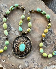 Green Oval Pendant Amulet Necklace, Spiritual Turquoise Medallion Necklace, Turquoise Amulet Necklace With Large Pendant, Green Turquoise Pendant Necklace With Spiritual Style, Amulet Style Turquoise Necklace With Large Pendant, Green Turquoise Pendant Necklace Spiritual Style, Green Turquoise Necklace With Large Southwestern Pendant, Green Turquoise Spiritual Pendant Necklace, Southwestern Turquoise Necklace With Large Green Pendant