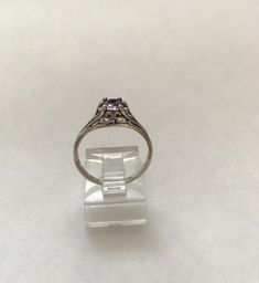 "This is a vintage sterling Silver Amethyst Antique look ring. The ring is a size 8 and is marked 925 as well as KABANA The amethyst oval stone measures 7mm x 5 mm (1caret). The presentation is 3/8\" north/south. It rises 1/4\" off the finger. It is in excellent pre owned condition." Classic Purple Sterling Silver Ring, Vintage Purple Sapphire Gemstone Ring, Classic Purple Sapphire Ring In Sterling Silver, Antique Purple Ring For Anniversary, Antique Purple Rings As Gift, Antique Purple Rings For Anniversary, Antique Purple Rings For Gift, Victorian Purple Ring With Center Stone, Vintage Purple Amethyst Ring For Anniversary