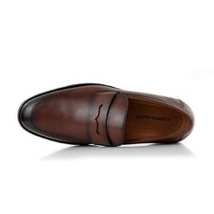 Introducing our refined leather loafers, the epitome of sophistication and style. Designed for the modern gentleman, these timeless classics exude elegance with every step. Whether it's a formal event or a casual outing, elevate your look effortlessly with these versatile essentials. Brand: Ferro Aldo Apron toe loafer with a decorative strap Easy slip-on access Memory foam insoles for added comfort Flexible outsoles Upper: Synthetic leather Lining: Microfiber Modern Formal Slip-ons With Brogue Detailing, Elegant Tassel Loafers With Moc Toe For Office, Elegant Office Tassel Loafers With Moc Toe, Elegant Moc Toe Slip-ons For Office, Timeless Slip-on Moccasins For Business, Modern Formal Slip-ons With Leather Lining, Modern Tassel Slip-on Loafers For Formal Occasions, Elegant Moc Toe Business Moccasins, Elegant Semi-formal Moc Toe Moccasins