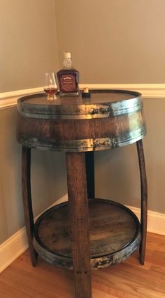 a wooden table with a bottle on top