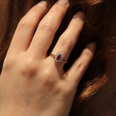 💍14K Solid Gold Minimalist Ruby Diamond Ring 💍 It is a perfect Valentine's Day gift, anniversary gift, gift for a woman, a gift for a grandmother,a Birthday gift. Details of the Product: Stones: Diamonds and Ruby. Carat: 0,25ct / Diamond: 0,03ct Ruby: 0,22ct Weight:  Approximately 2,50g Pieces: 1 Ruby and 12 Diamonds Cut: Pear - Rings are complementary pieces that transform plain looks into stylish combinations.  - All of our products are handmade produced of 8K, 14K, 18K real gold. The certificates of the diamonds we use in our products will be delivered by the cargo together with your orders. - Make sure you choose the right size and color before completing your order. If there is a preference you want to change, please contact us via message before your order is shipped. - All of our Pear Rings, Gemstone Diamond Ring, Pear Ring, Diamond Stacking Rings, Ruby Diamond Rings, Ring Stacking, Fancy Jewelry, July Birthstone, Ruby Diamond