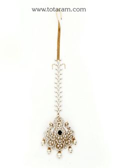 18 Karat Gold "Peacock - Detachable" Diamond Maang Tikka cum Pendant - Papidi Billa with Color Stones & South Sea Pearls
  This Product can be used as Pendant.
  This product has Inter Changeable Stones in the Pendant.
  Gross Weight of the Pendant without Chain : 12.300 Grams
  Gross Weight of the Diamond Tikka Chain without Pendant : 4.750 Grams
  Length of the Pendant : 2.15 inches
  Width of the Pendant :  1.25 inches
 - 235-GT496 - in 17.050 Grams for USD $3,684.55 USD. 
Made in India by To Elegant Hand Set Tikka For Festive Occasions, Elegant Ceremonial Tikka With Tilla Detailing, Elegant Hand Set Tikka For Ceremonial Occasion, Elegant Hand Set Ceremonial Tikka, Elegant Ceremonial Hand Set Tikka, Elegant Ceremonial Tikka With Intricate Design, Elegant Tikka For Festivals, Elegant Ceremonial Tikka For Diwali, Ceremonial Elegant Cutdana Tikka