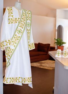 Orthodox deacon vestments set. Fully embroidered, made from silk. It includes stikharion, cuffs and orarion. After the order we will ask your measurements. It takes about four week to produce it and ship to you. We locate in FL, USA. Festive White Embroidered Habesha Kemis, Green Sets With Gold Embroidery In Traditional Drape, Green Sets With Gold Embroidery For Eid, Traditional White Embroidered Habesha Kemis, White Habesha Kemis With Traditional Patterns For Eid, Ceremonial White Traditional Wear With Gold Embroidery, Traditional White Sets With Gold Embroidery, White Agbada For Ceremonial Festive Occasions, Traditional Green Kurta With Gold Embroidery