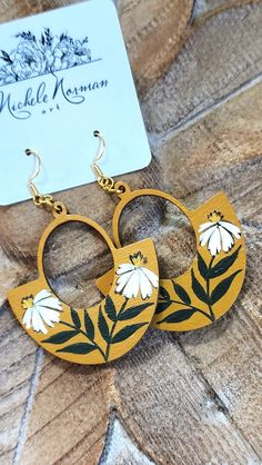 This listing is for one pair of handpainted wood earrings with nickel free gold color hardware. All designs are completely created by Michele Norman. Main color: Yellow Earring length (not including hardware): 2" Hand Painted Yellow Artsy Earrings, Artsy Hand Painted Everyday Earrings, Hand Painted Artsy Earrings For Everyday, Yellow Hand Painted Artsy Earrings, Everyday Hand Painted Artsy Earrings, Artsy Hand Painted Earrings For Everyday, Hand Painted Bohemian Earrings For Everyday, Hand Painted Drop Earrings For Everyday, Everyday Hand Painted Gold Earrings