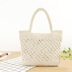 Brand Name: YogodlnsShape: Casual ToteMain Material: StrawOrigin: CN(Origin)Style: BohemianOccasion: VersatileClosure Type: zipperGender: WOMENLining Material: PolyesterHardness: SOFTPattern Type: KnittingBeach Bag: Summer Beach BagBag: Hollow Out BagShoulder Bags: Women Shoulder BagsStraw Bag: Girls Hand Bag Rope Weaving, Crochet Beach Bags, Straw Weaving, Net Bag, Woven Tote Bag, Handmade Handbags, Tote Pattern, Casual Tote, Shopper Tote