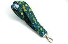 This cute lanyard has beautiful leaves with all animals in a jungle design. This lanyard is very beautiful in person. You can have a wardrobe of lanyard to match your outfit. This lanyard is made of soft 100% cotton fabric to give a comfortable feel around your neck. This lanyard is easy to take care. You can spot clean and throw in a washer and hang dry. If you want you can iron and it is ready to use. These lanyards are perfect if you have metal allergy. Each of these lanyards will have a slig Adjustable Green Lanyards As Gifts, Cute Lanyard, Jungle Design, Elephant Fabric, Cute Lanyards, Beautiful Leaves, Fabric Lanyard, All Animals, Have Metal