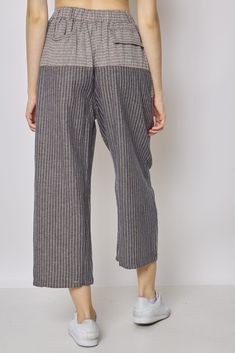 Description


Bring a touch of casual sophistication to your wardrobe with our striped gray linen pants. Its fluid and light cut offers you optimal comfort while remaining stylish. Imagine yourself walking through the streets of Paris, dressed in these trendy pants, ready to face the freshness of autumn. Wear it with a wool sweater and ankle boots for a casual outfit while walking around town. For a special night out, pair it with a sleek blouse and heels for a sophisticated look. Our gray strip Casual Wide Leg Ankle-length Striped Pants, Casual Ankle-length Wide Leg Pants With Vertical Stripes, Striped Cotton Wide Leg Ankle-length Pants, Casual Pinstripe Ankle-length Bottoms, Relaxed Fit Pants With Vertical Stripes, Chic Striped Linen Bottoms, Relaxed Fit Ankle-length Pants With Vertical Stripes, Striped Linen Bottoms For Spring, Relaxed Fit Ankle-length Striped Pants