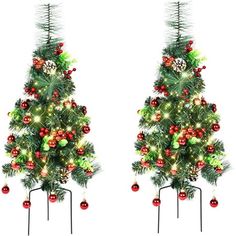 two christmas trees with ornaments and lights on them are shown in front of a white background