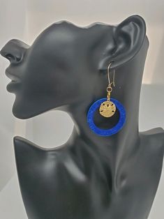 ~Welcome to Encased in Elegance!~ These are perfect for the summer! I handmade these blue resin circles and painted the backsides a nice blue color, so they are two toned blue. The kidney earrings and jump rings are 14k gold, except for the larger jump ring with is gold plated. The sanddollar is made of brass. In the photos above, the last photo shows the front and the back together. The 2nd to last photo shows the backsides only. Please do not leave resin products in the sun! Please note that t Blue Hoop Earrings With Ear Wire, Blue Hoop Earrings With Ear Wire For Beach, Blue Ear Wire Earrings For The Beach, Blue Dangle Earrings For The Beach, Blue Hoop Jewelry For The Beach, Adjustable Blue Hoop Earrings For Beach, Blue Hoop Earrings For Gift, Elegant Blue Jewelry For Beach, Blue Metal Jewelry For Beach