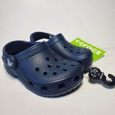 Crocs Toddler Classic Navy Blue Slip On Clogs Kids Size C6 Boys Girls Casual Brand New Navy Blue Size C6 Cute Blue Non-slip Clogs, Casual Round Toe Sandals For Daycare, Casual Slip-on Clogs With Soft Sole, Synthetic Closed Toe Clogs For Playtime, Blue Non-slip Clogs For Summer, Non-slip Closed Toe Clogs For Playtime, Casual Slip-on Clogs For Playtime, Spring Playtime Closed Toe Clogs, Casual Closed Toe Clogs With Soft Sole