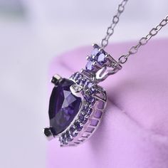 Experience the Transformative Power of Amethyst Discover the elegance and emotional depth of our Amethyst Love Pendant Necklace, a stunning piece that not only enhances your style but also serves as a powerful healing tool. Key Features: Heart-shaped Design: Symbolizes love and compassion, making it a perfect gift for yourself or a loved one. Rich Purple Color: Represents spiritual awareness and tranquility, adding a touch of luxury to your look. Classic Style: Timeless design that complements a Purple Pendant Necklace, Engagement Necklaces, Amethyst Heart, Crystal Heart Pendant, Halo Pendant, February Birthstone, Healing Jewelry, Silver Plated Necklace, Amethyst Necklace