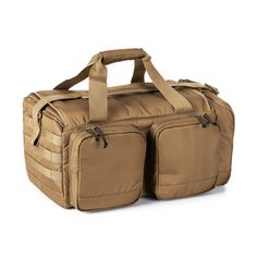 the large duffel bag is tan and has two compartments on each side that are open