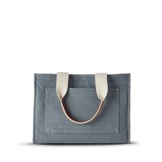 Meet the Runabout Open Tote—our unisex, everyday travel companion that’s just as functional as it is good-looking. | Shinola Runabout Open Tote Bag | Canvas Shinola Detroit, Canvas Leather Tote Bag, Tool Bags, Nickel Hardware, Bag Canvas, Waxed Canvas, Travel Companion, Small Accessories, Leather Care