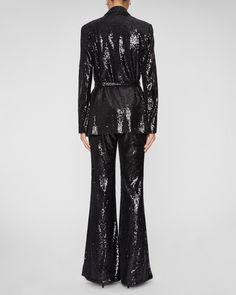 Self: 100% polyester Lining: 100% polyester Flat-set sequined fabric Shoulder pads Peaked lapels Self-tie belted waist Fully lined Spot clean only