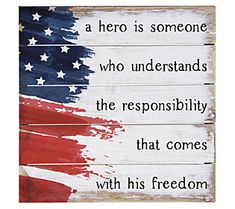 an american flag painted on wooden planks with the words hero is someone who understands the