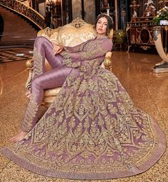 COLOR : Lavender FABRIC : Top - Premium Butterfly Net, Inner (Blouse & Lehenga) - Muslin, Bottom - Butterfly Net Lehenga & Silk Pants, Dupatta - Premium Butterfly Net WORK : Heavy Zari Work, Hand Work, Motifs, Stones, Swarvoski, Sequins, Lace Border OCCASION : Wedding, Reception, Engagement, Party Wear, Bridal WearADDITIONAL INFO : The outfit comes with complimentary embroidered silk pants besides the lehenga READY-TO-WEAR : NoSTITCHING : Available as semi-stitched fabric, can be stitched using Light Purple Ball Gown, Bridal Anarkali Suits, Bridal Anarkali, Celana Fashion, Designer Bridal Lehenga Choli, Designer Salwar Kameez, Lehenga Choli Wedding, Bollywood Party, Designer Bridal Lehenga